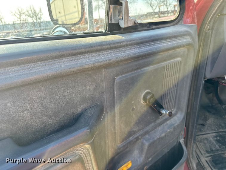 image for item FB0712 1994 Ford F600 flatbed truck