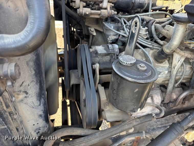 image for item FB0712 1994 Ford F600 flatbed truck