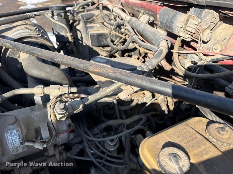 image for item FB0712 1994 Ford F600 flatbed truck