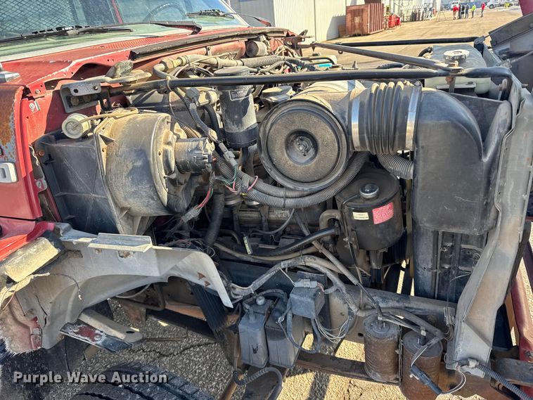 image for item FB0712 1994 Ford F600 flatbed truck