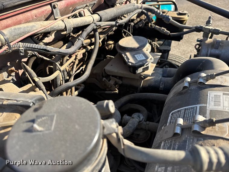 image for item FB0712 1994 Ford F600 flatbed truck