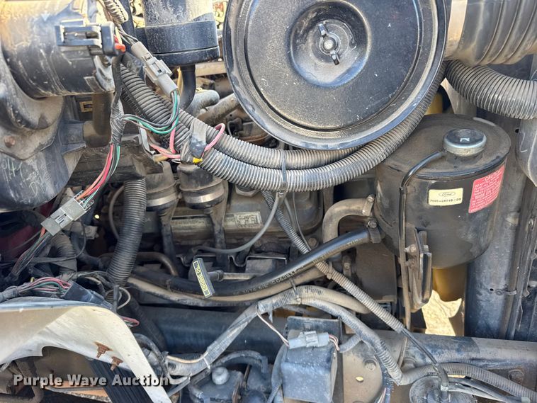 image for item FB0712 1994 Ford F600 flatbed truck