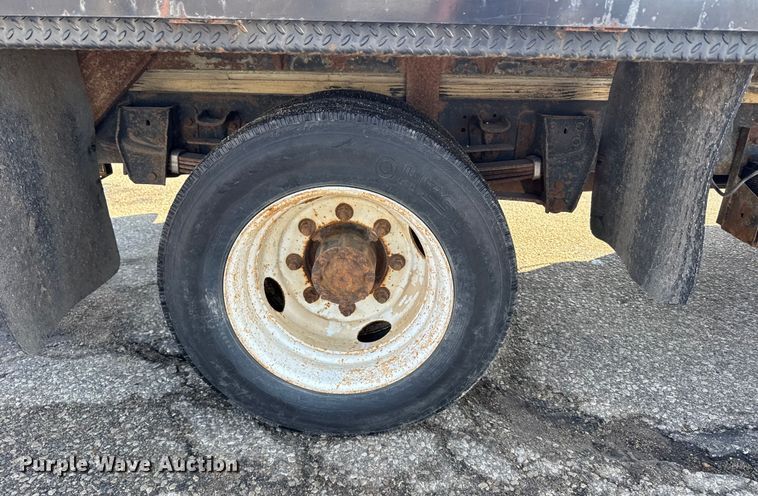 image for item FB0712 1994 Ford F600 flatbed truck