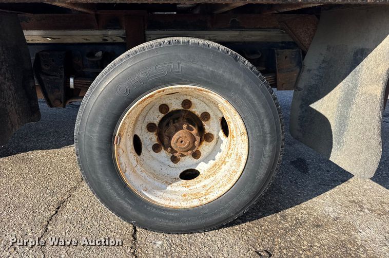 image for item FB0712 1994 Ford F600 flatbed truck