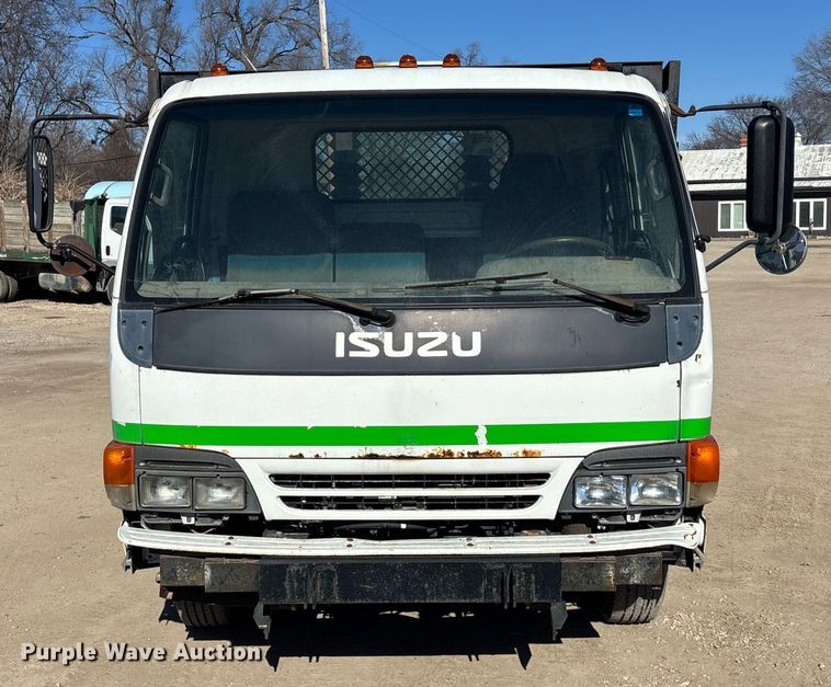 image for item FO3569 1999 Isuzu NPR dump flatbed truck