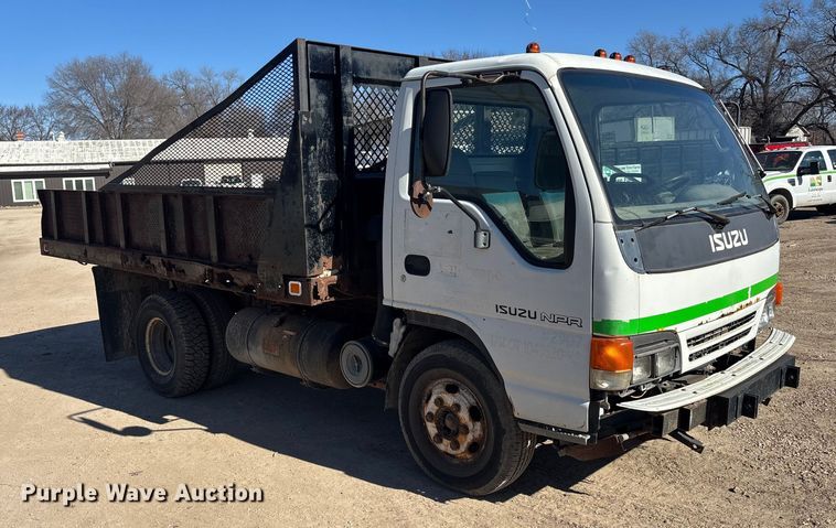 image for item FO3569 1999 Isuzu NPR dump flatbed truck