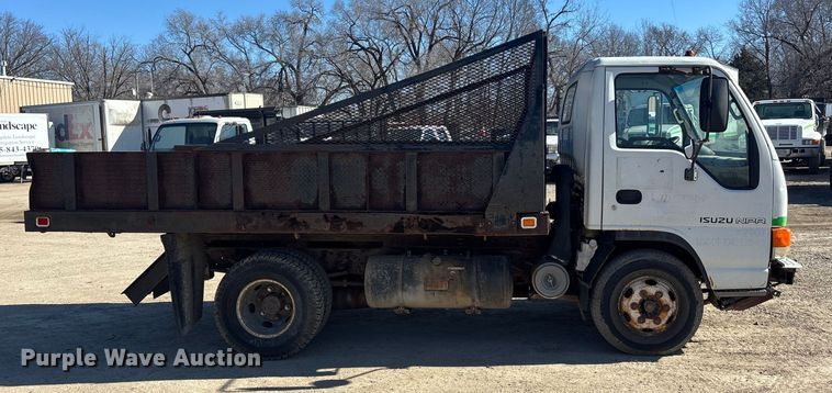 image for item FO3569 1999 Isuzu NPR dump flatbed truck