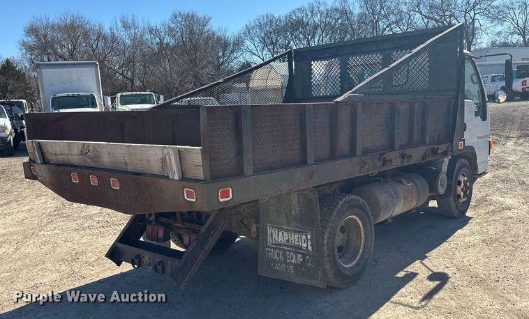 image for item FO3569 1999 Isuzu NPR dump flatbed truck