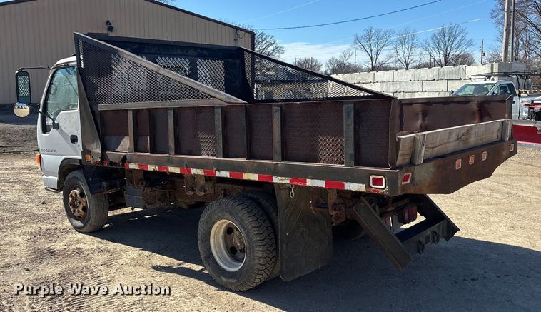 image for item FO3569 1999 Isuzu NPR dump flatbed truck