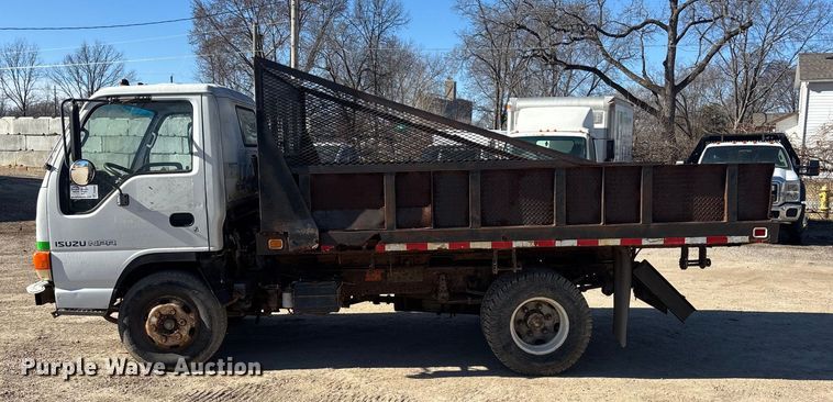 image for item FO3569 1999 Isuzu NPR dump flatbed truck