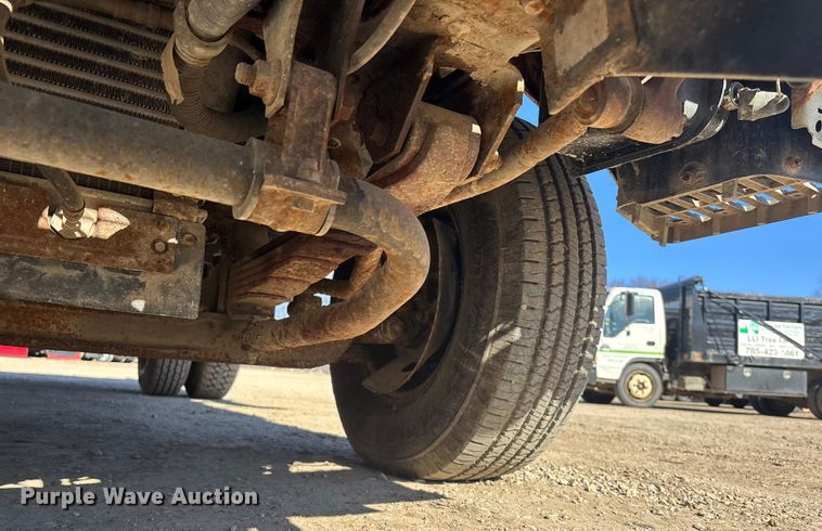 image for item FO3569 1999 Isuzu NPR dump flatbed truck