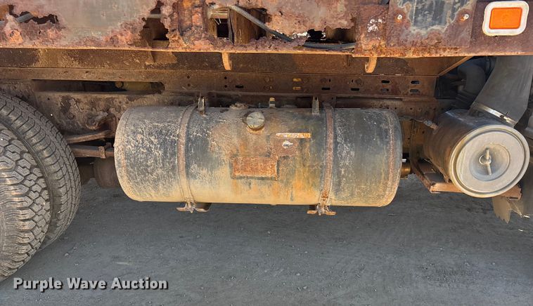 image for item FO3569 1999 Isuzu NPR dump flatbed truck