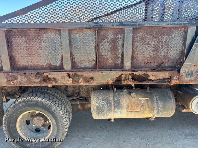 image for item FO3569 1999 Isuzu NPR dump flatbed truck