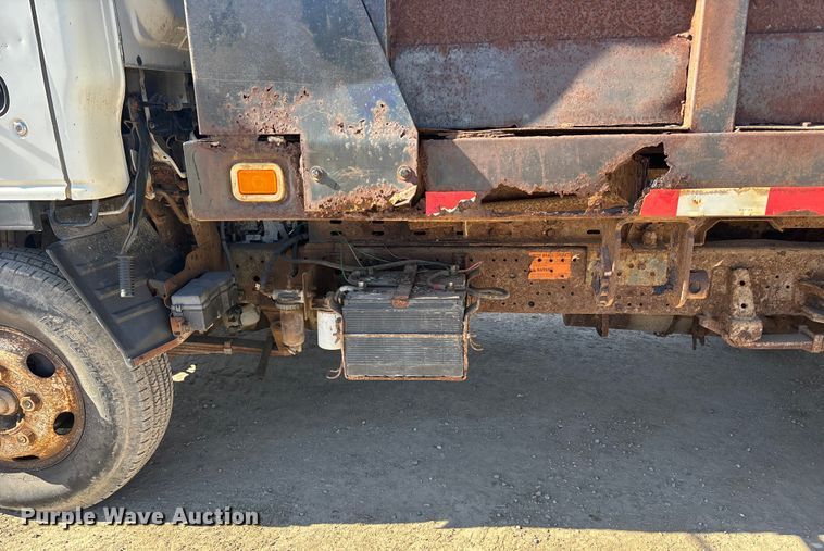 image for item FO3569 1999 Isuzu NPR dump flatbed truck