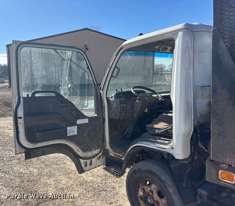 image for item FO3569 1999 Isuzu NPR dump flatbed truck