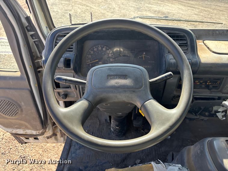 image for item FO3569 1999 Isuzu NPR dump flatbed truck