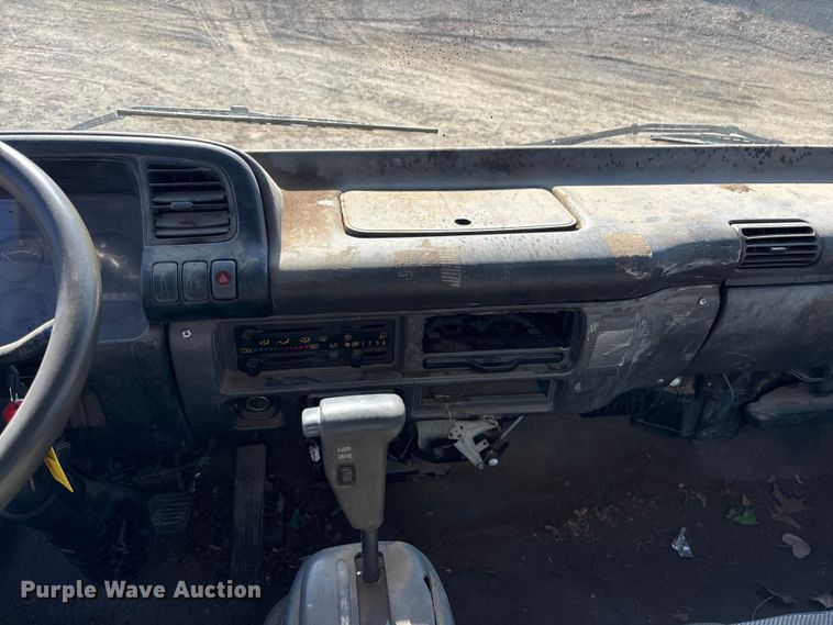 image for item FO3569 1999 Isuzu NPR dump flatbed truck