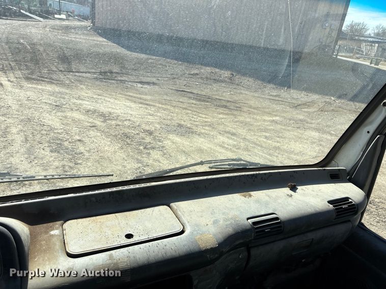 image for item FO3569 1999 Isuzu NPR dump flatbed truck