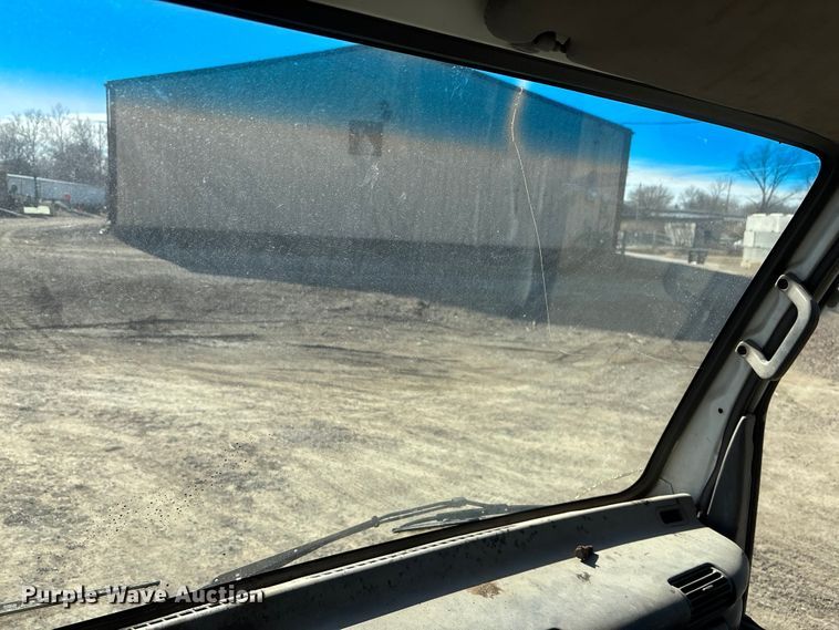 image for item FO3569 1999 Isuzu NPR dump flatbed truck