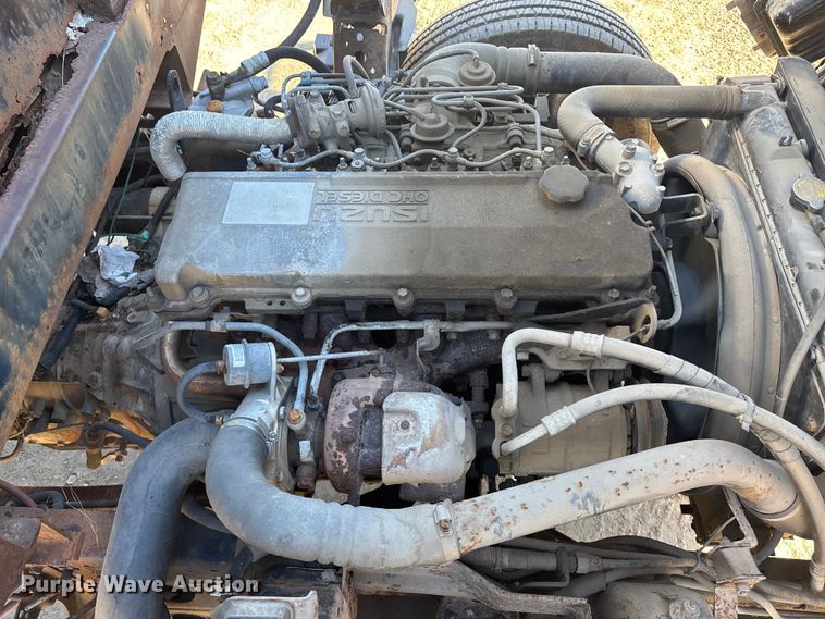 image for item FO3569 1999 Isuzu NPR dump flatbed truck