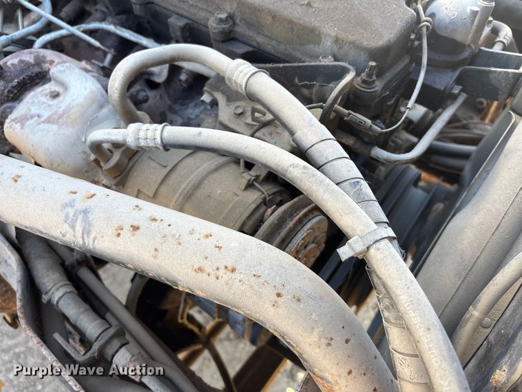 image for item FO3569 1999 Isuzu NPR dump flatbed truck