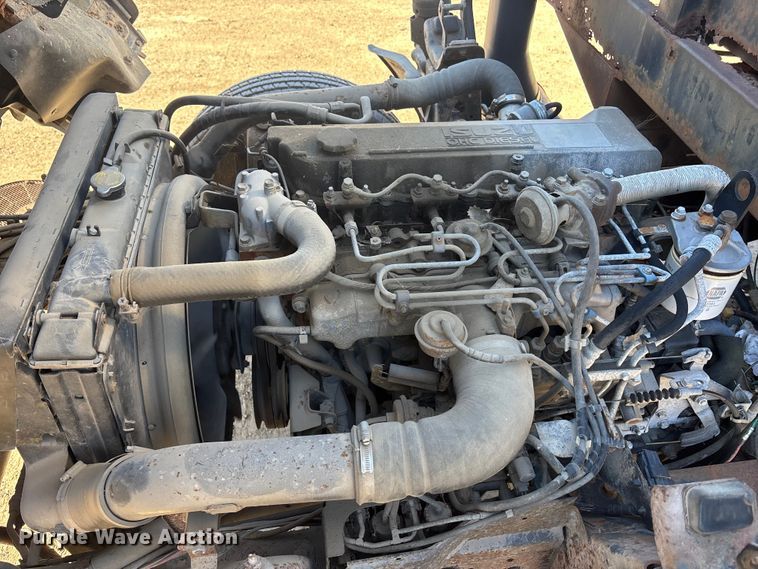 image for item FO3569 1999 Isuzu NPR dump flatbed truck