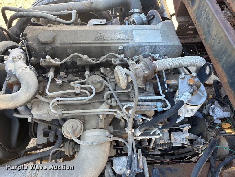 image for item FO3569 1999 Isuzu NPR dump flatbed truck