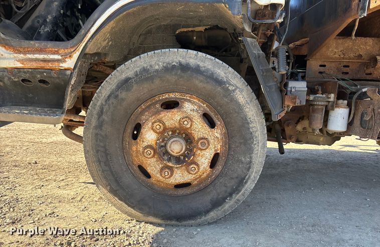 image for item FO3569 1999 Isuzu NPR dump flatbed truck