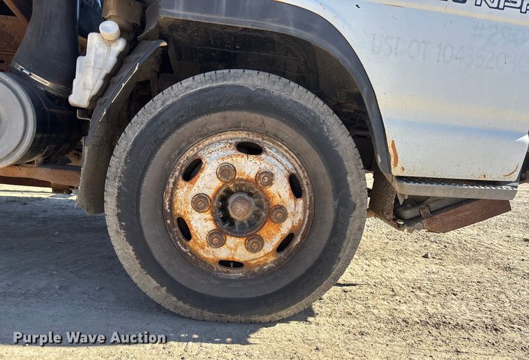 image for item FO3569 1999 Isuzu NPR dump flatbed truck