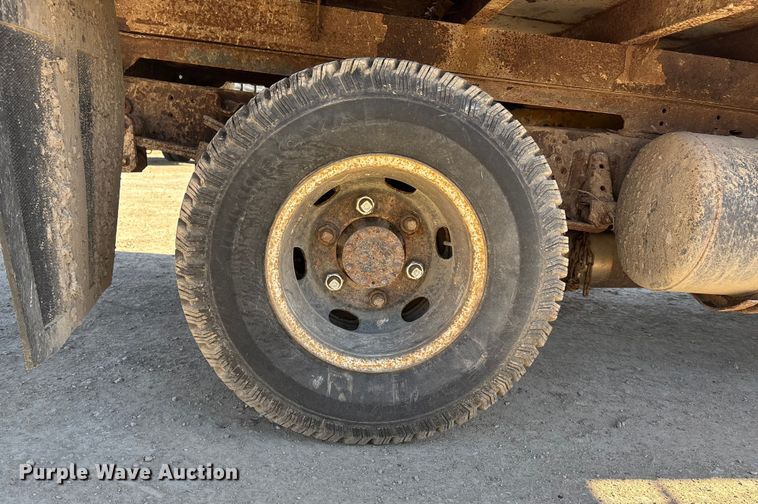 image for item FO3569 1999 Isuzu NPR dump flatbed truck