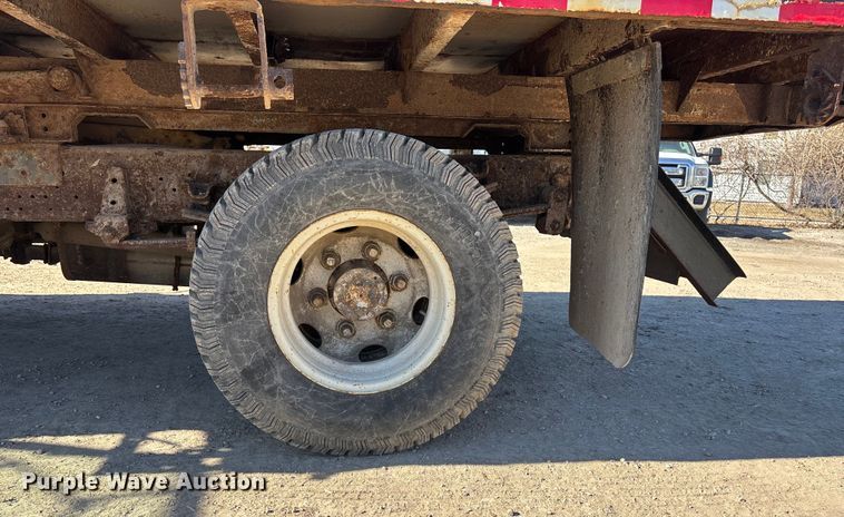 image for item FO3569 1999 Isuzu NPR dump flatbed truck