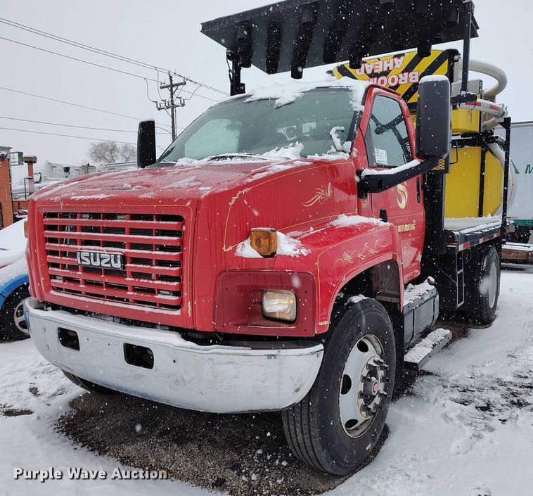 image for item DT0877 2005 Isuzu H6500 flatbed truck with crash attenuator