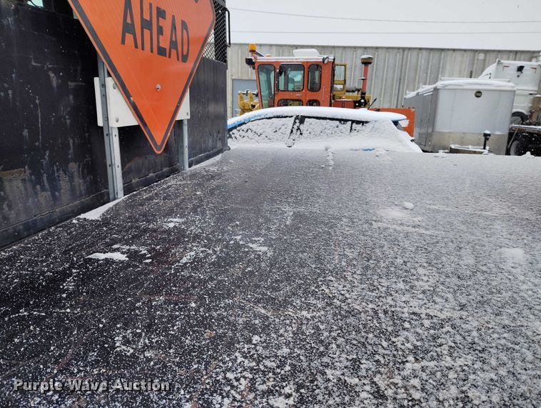 image for item DT0877 2005 Isuzu H6500 flatbed truck with crash attenuator