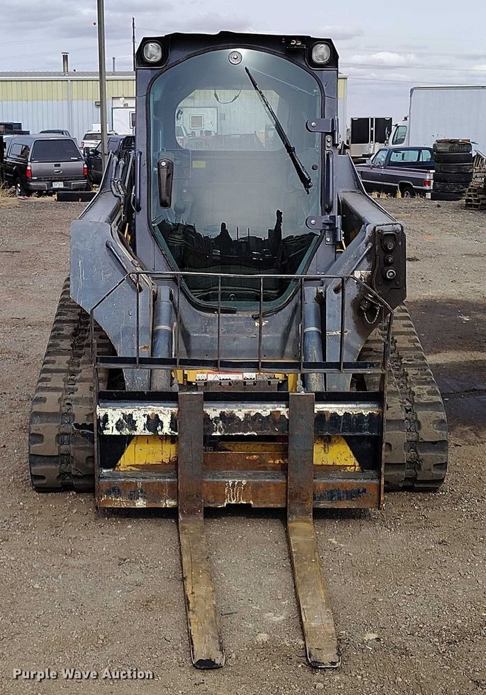 image for item DT0940 2016 John Deere 323E tracked skid steer loader