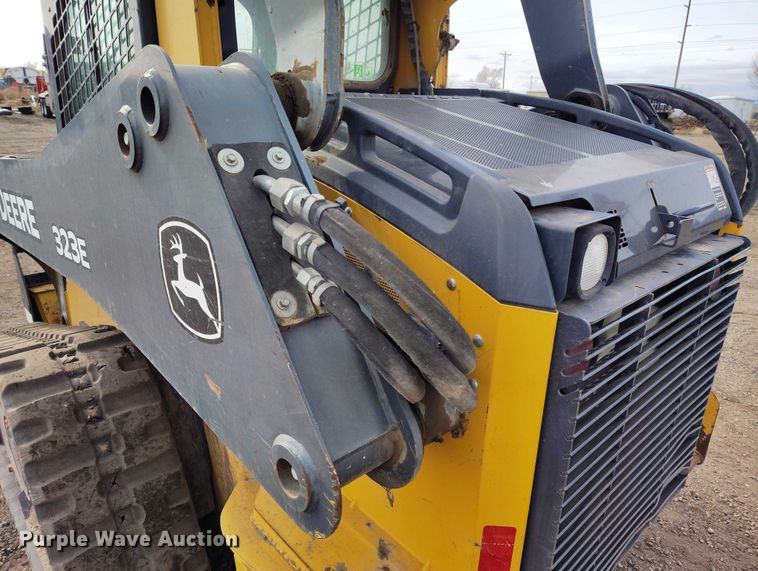 image for item DT0940 2016 John Deere 323E tracked skid steer loader