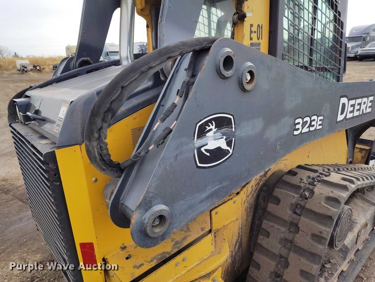 image for item DT0940 2016 John Deere 323E tracked skid steer loader