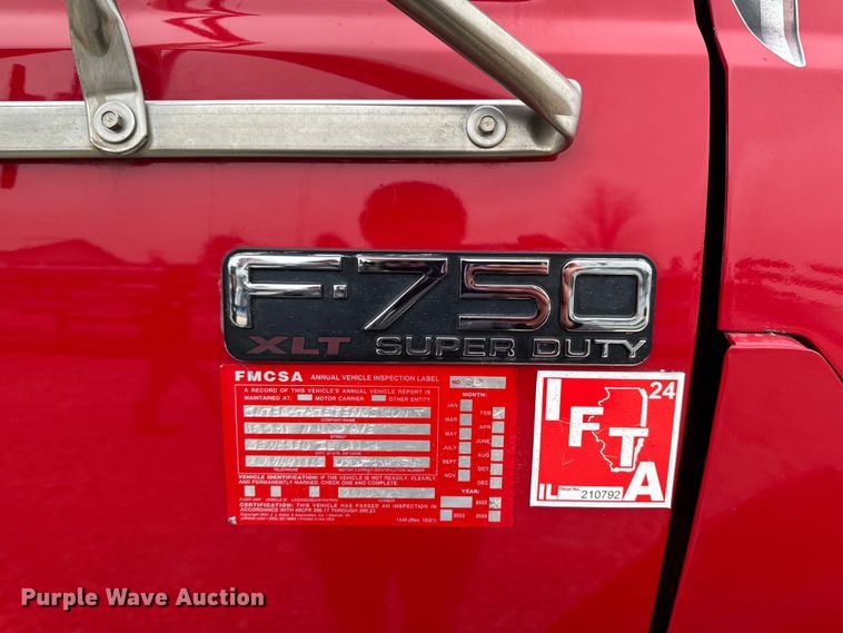 image for item EA2086 2003 Ford F750 Crew Cab flatbed truck