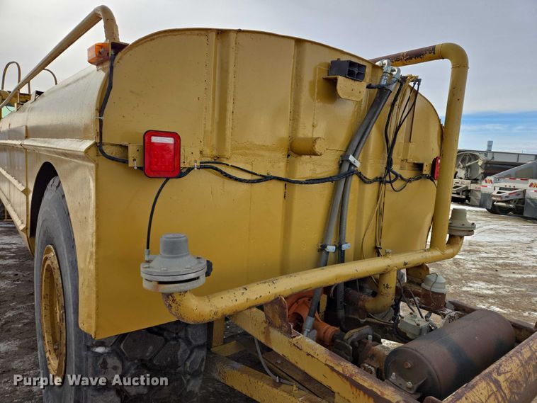image for item EB1289 1993 Caterpillar 613C water wagon