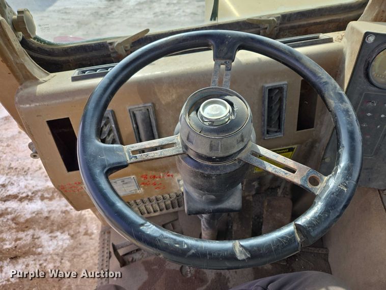 image for item EB1289 1993 Caterpillar 613C water wagon