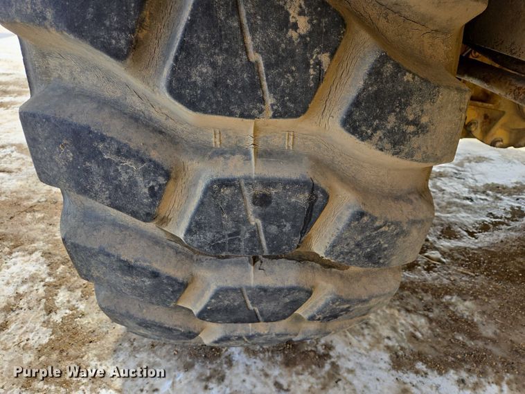 image for item EB1289 1993 Caterpillar 613C water wagon