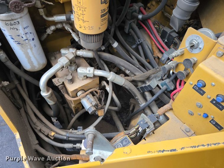 image for item EB1300 2010 Caterpillar CB-64 double drum vibratory roller