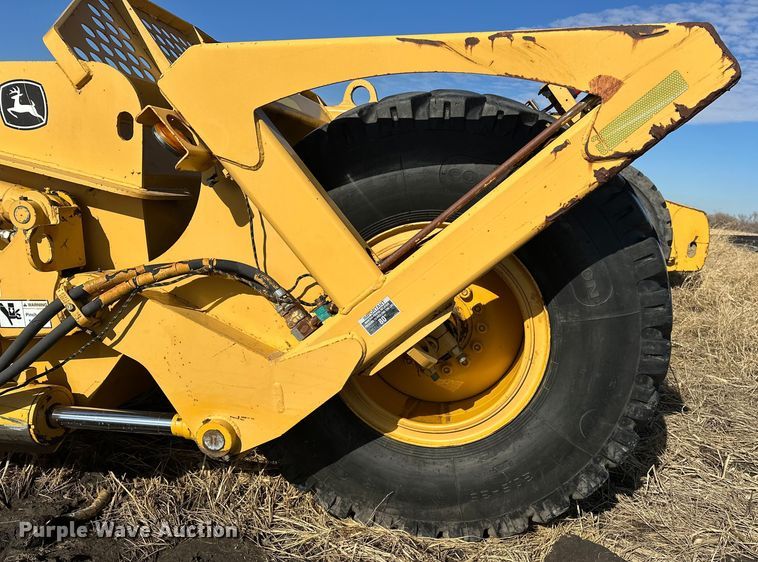 image for item ES1023 2005 John Deere 1812C scraper