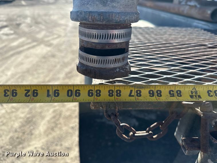 image for item ES1024 1985 Ford L7000 hook lift truck with tank