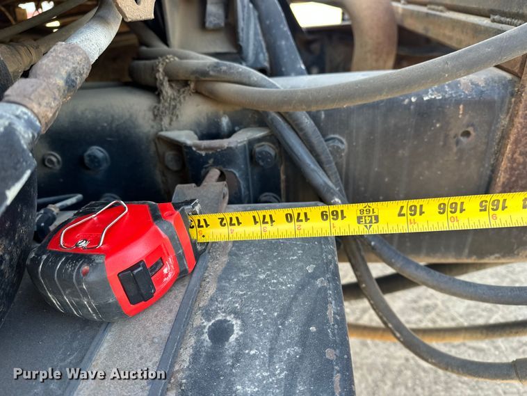 image for item ES1024 1985 Ford L7000 hook lift truck with tank