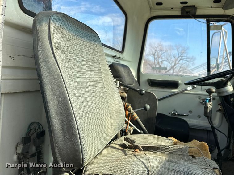 image for item ES1024 1985 Ford L7000 hook lift truck with tank