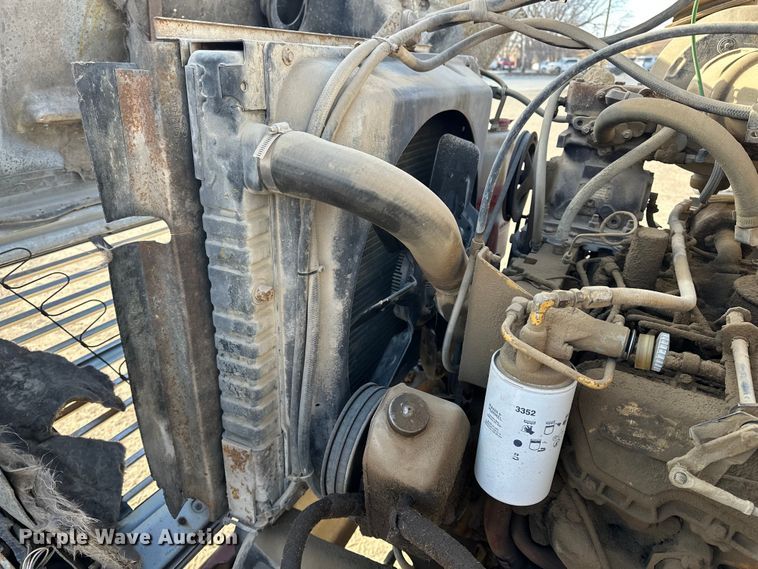 image for item ES1024 1985 Ford L7000 hook lift truck with tank