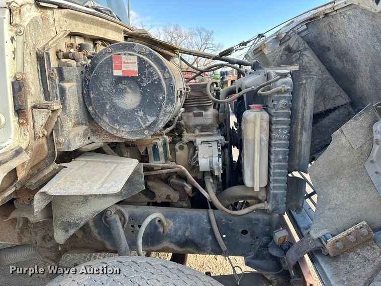 image for item ES1024 1985 Ford L7000 hook lift truck with tank