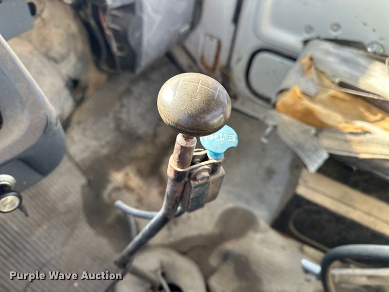 image for item ES1024 1985 Ford L7000 hook lift truck with tank