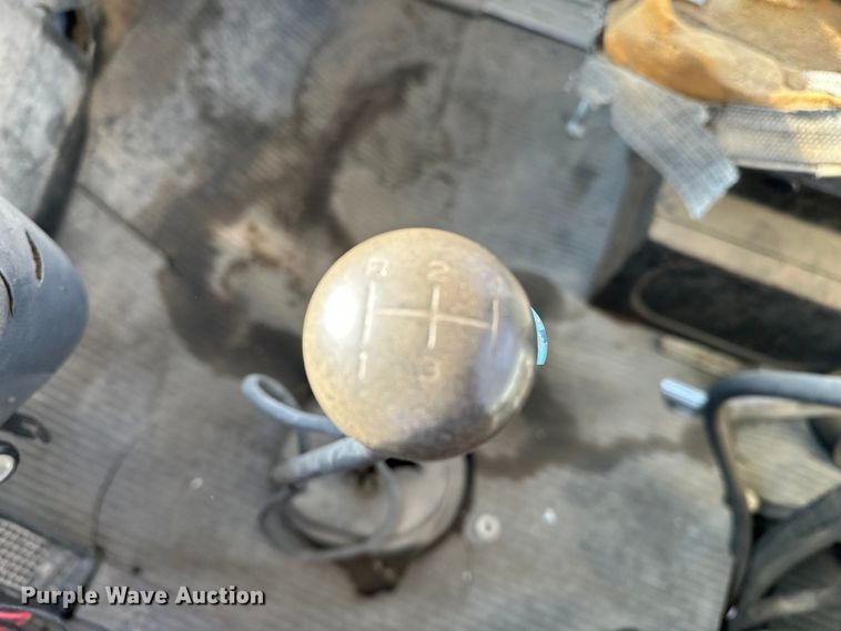 image for item ES1024 1985 Ford L7000 hook lift truck with tank