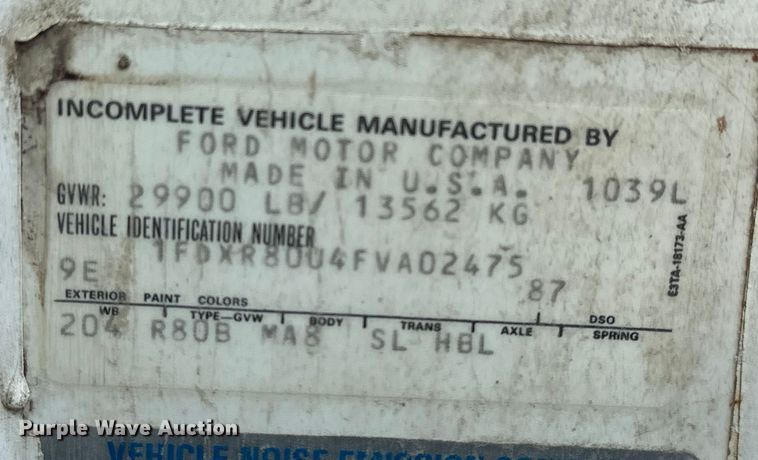 image for item ES1024 1985 Ford L7000 hook lift truck with tank